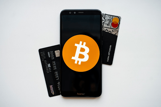 Are cryptocurrencies mobile money closing the gap or creating